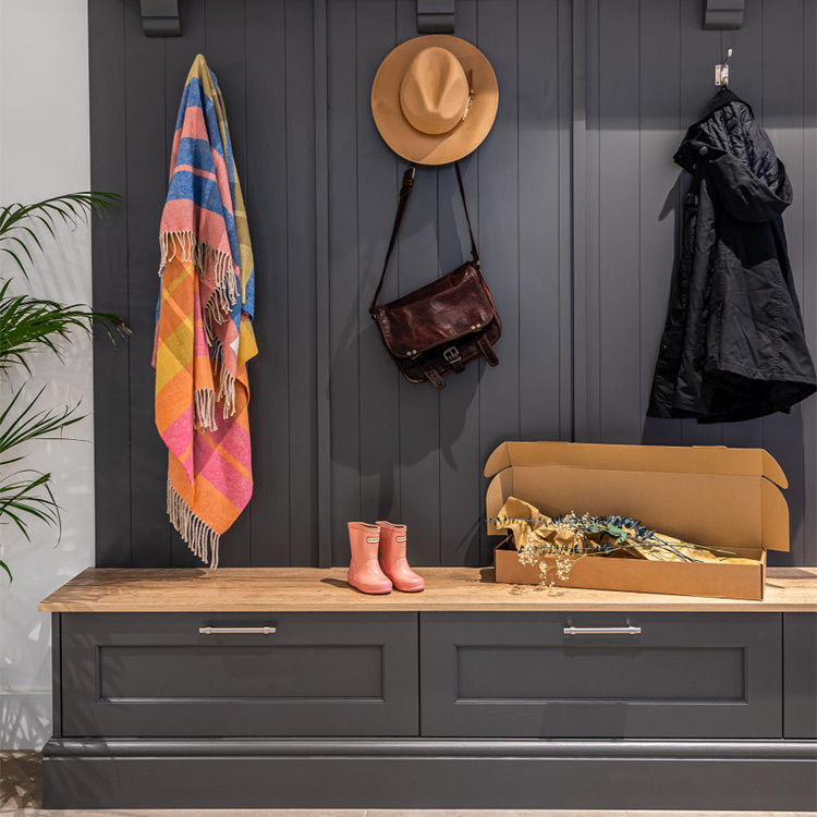 A grey boot room cupboard