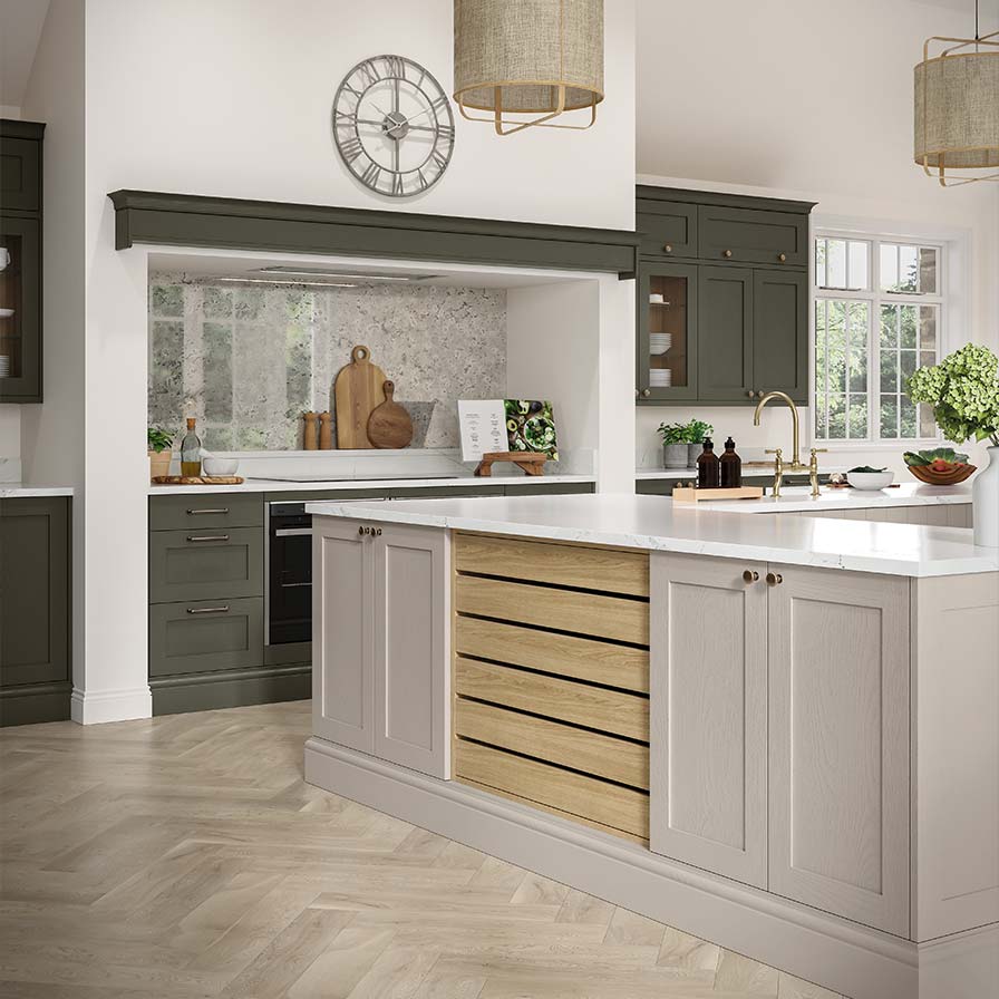 Green shaker kitchen with oak crate drawers