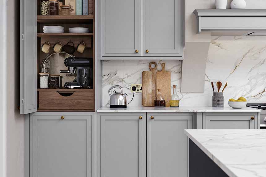 A grey Shaker kitchen with in-frame-effect doors and dark wood cabinetry