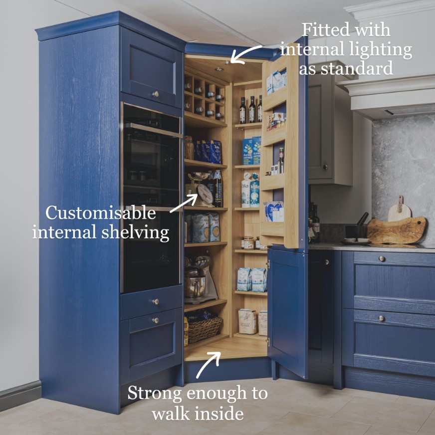 Lansbury corner kitchen pantry with open door and oak shelves