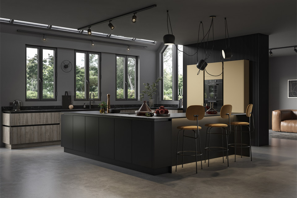 A black handleless kitchen with a black kitchen island