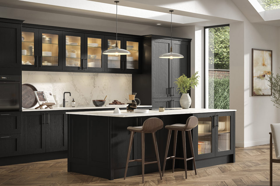 A black Shaker kitchen with traditional black kitchen cupboards