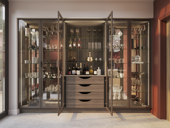 A dark wood pantry with glass doors and glass shelves