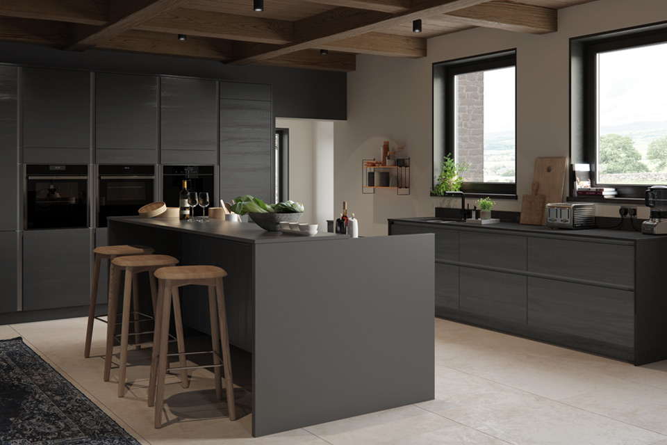 A dark grey kitchen with wooden kitchen island barstools and Japanese décor