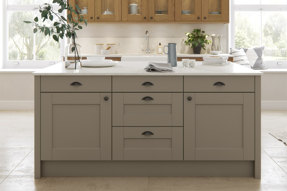 A painted Shaker kitchen with a white marble worktop