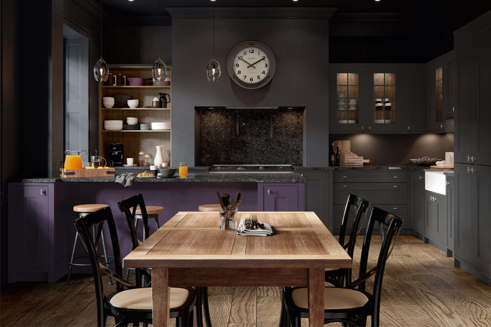 A deep purple kitchen with mulberry kitchen doors and grey worktops