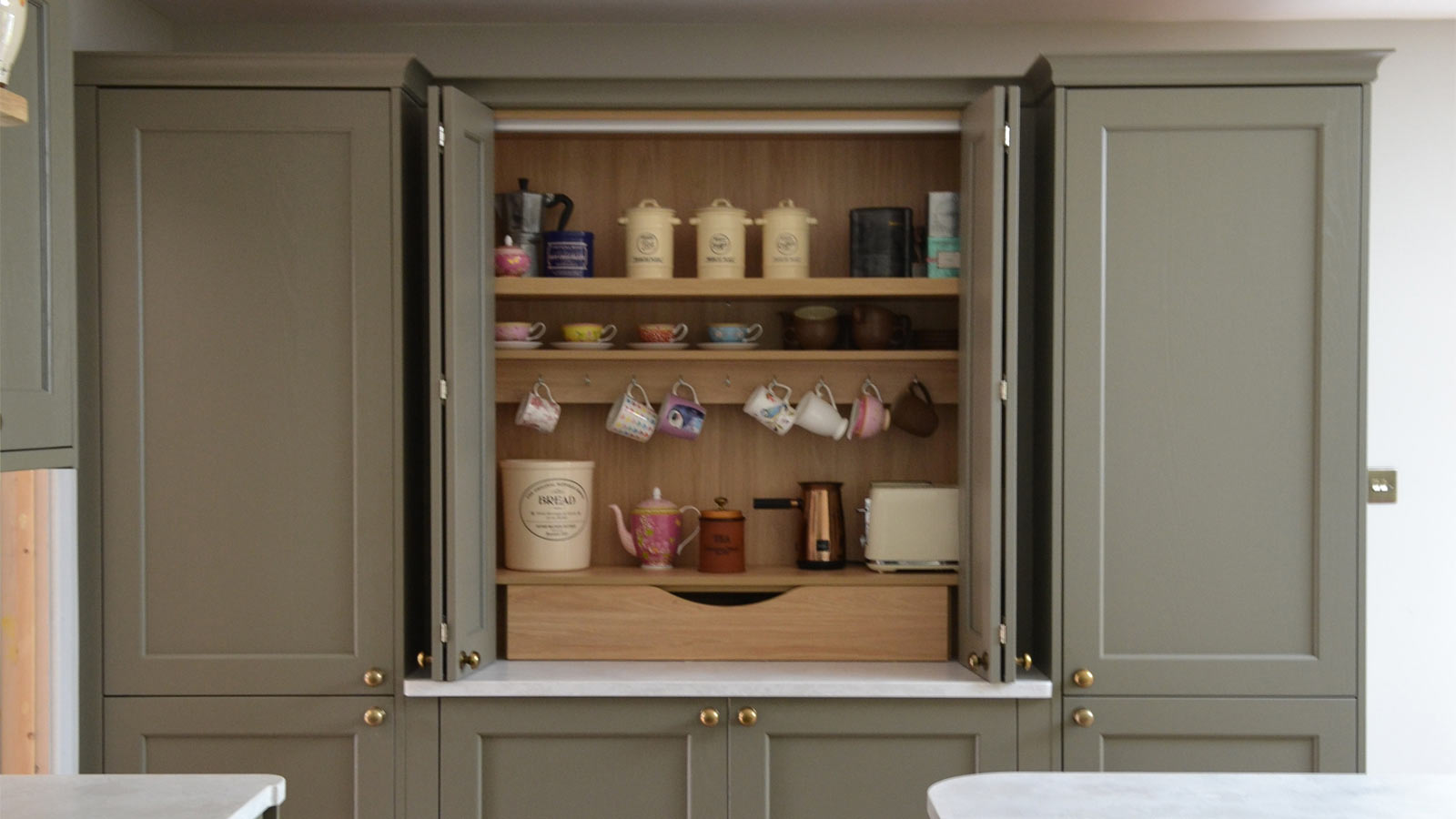 A breakfast dresser unit with a Danish kitchen aesthetic