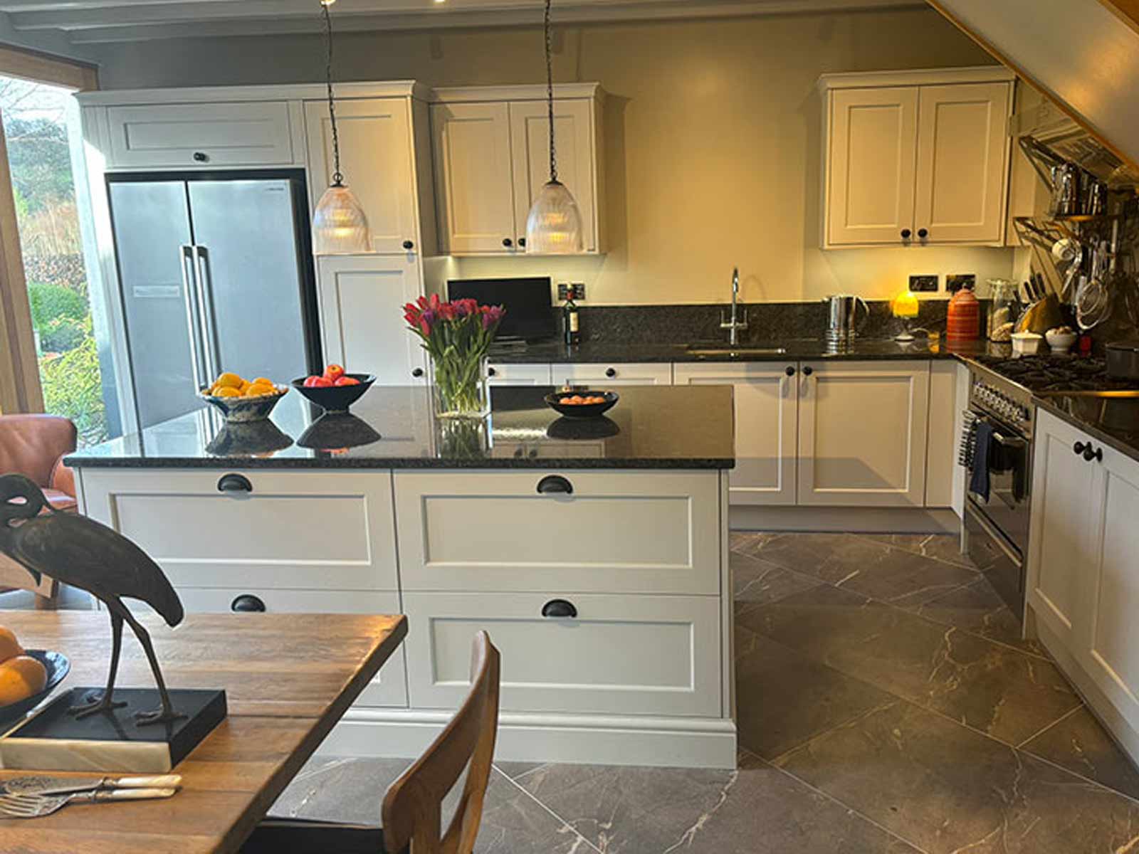 A Victorian kitchen with classic doors and marble worktops