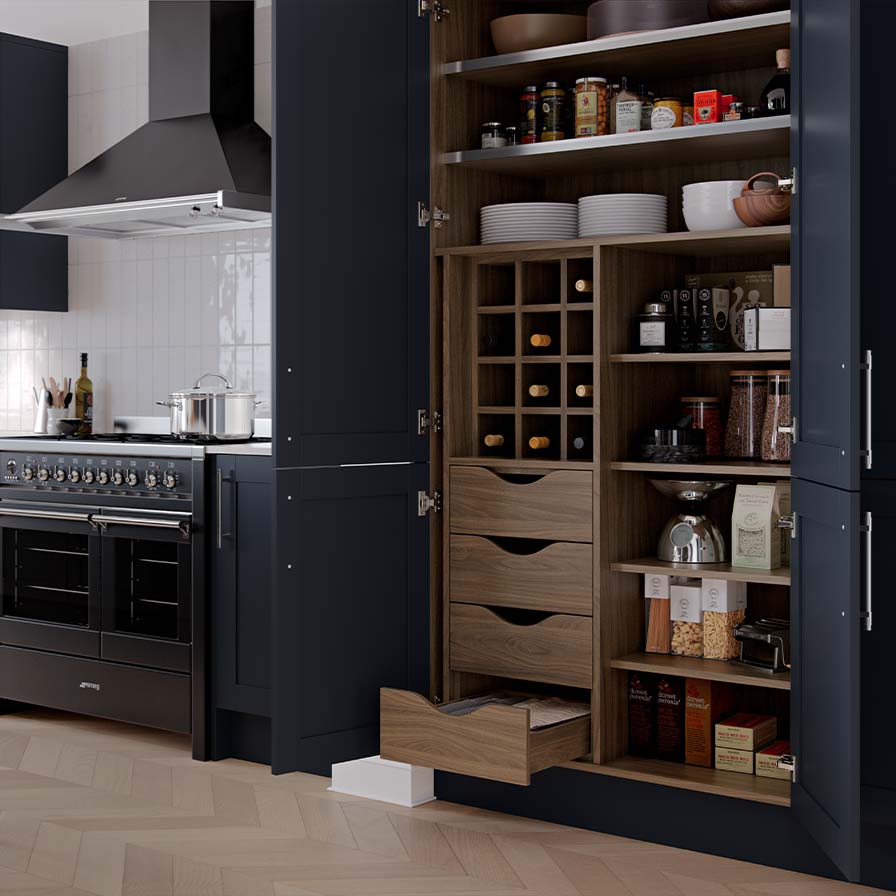 Modern shaker kitchen in dark blue, with a pantry in walnut